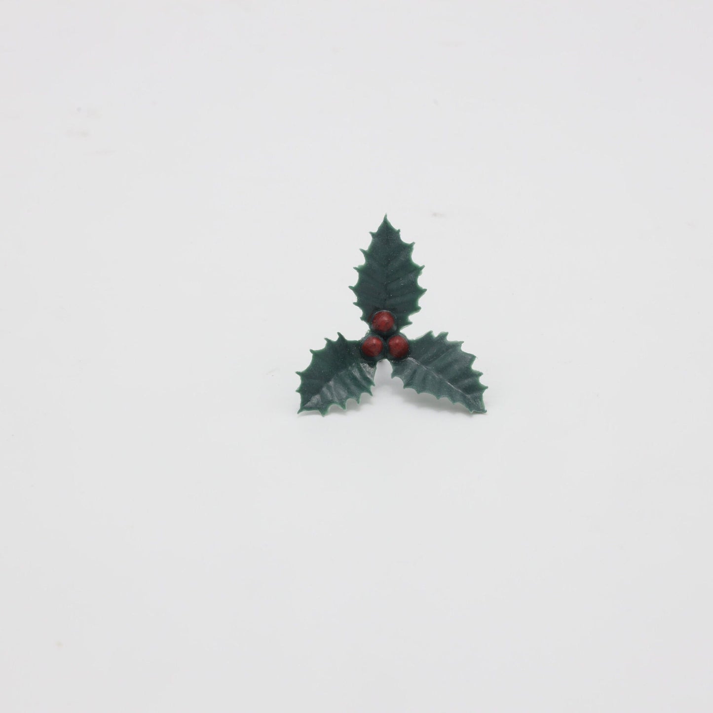 Plastic Holly Leaf Cake Decoration: Christmas Cupcake Topper (37mm, 20pc)